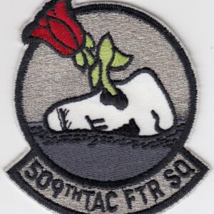 A patch with a rose on it.