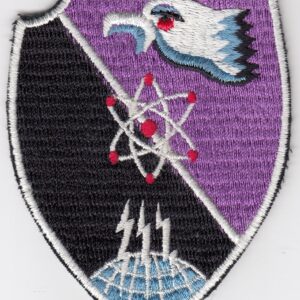 A purple and black patch with an eagle on it.