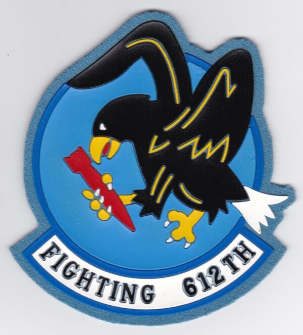 A patch with an eagle holding a gun.