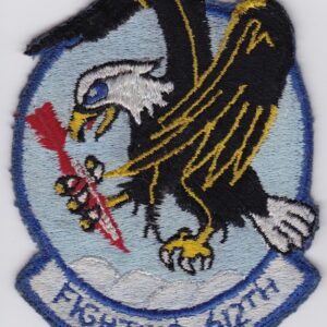 A patch with an eagle holding a gun.