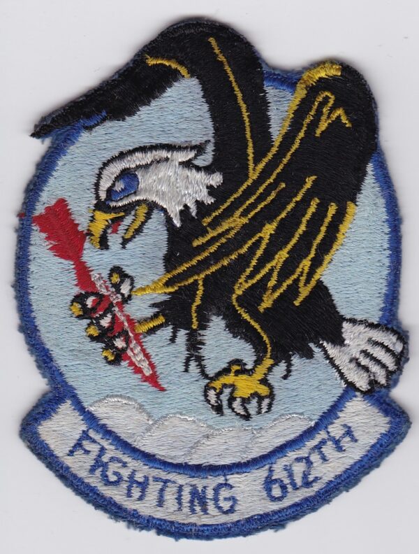 A patch with an eagle holding a gun.