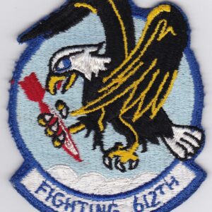 A patch with an eagle holding a gun.