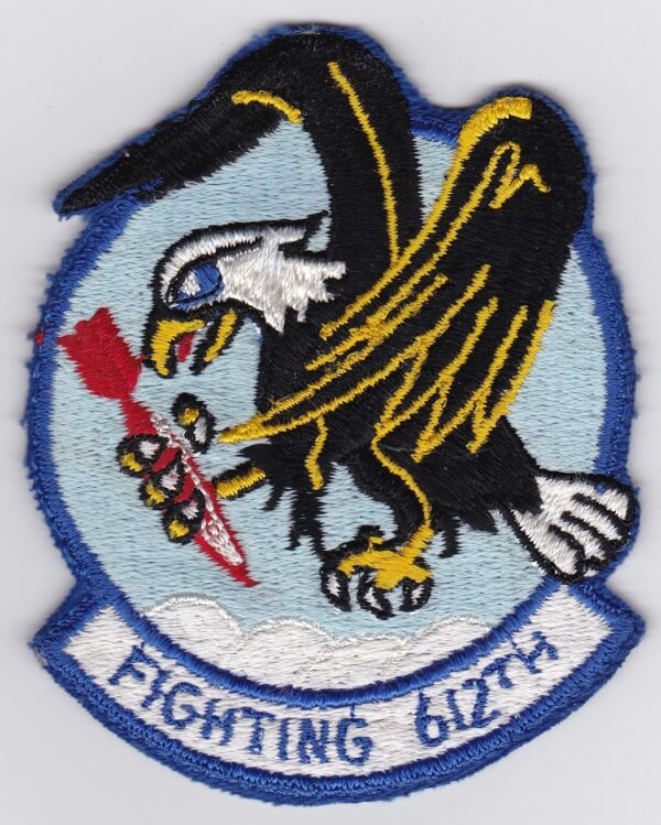 A patch with an eagle holding a gun.