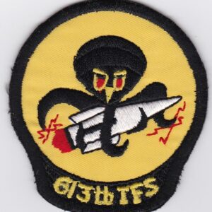 A patch with an image of a rocket on it.