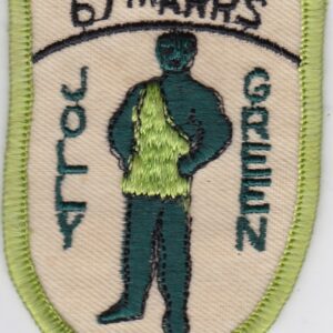 A patch with an image of a man in a green shirt.