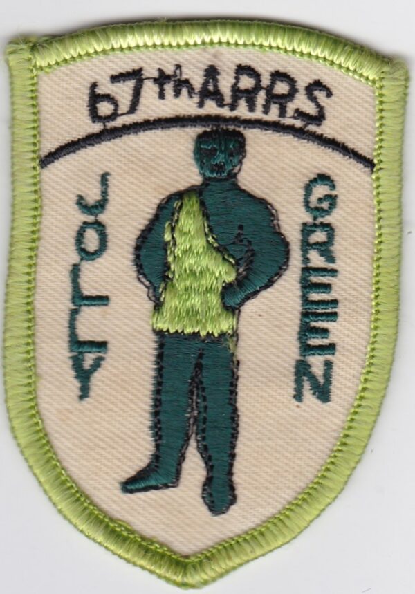 A patch with an image of a man in a green shirt.