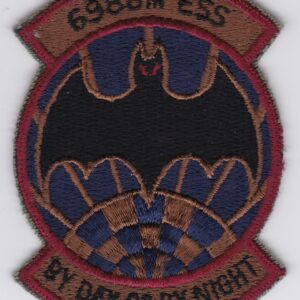 A patch with a bat on it.