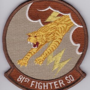 A patch with an image of a tiger flying through the air.