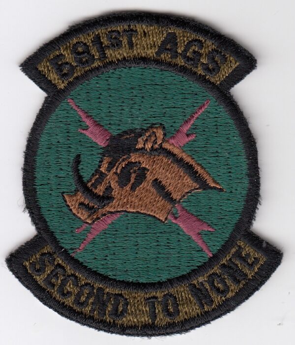 A patch with the words second to none on it.