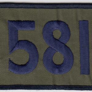 A patch with the number 581 on it.