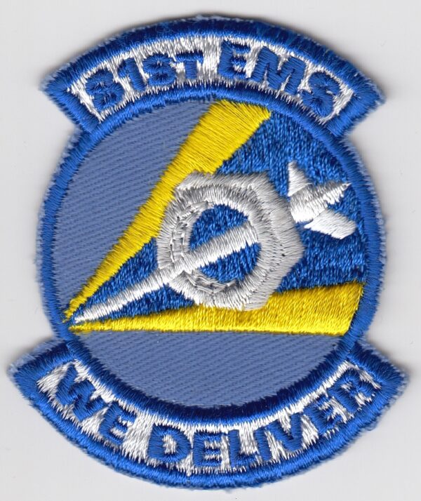 A patch with the words st ems we deliver.