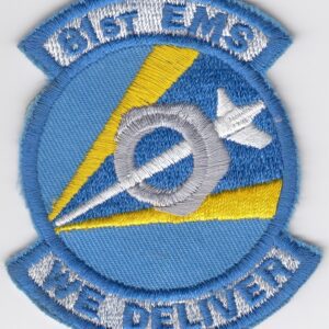 A blue and yellow patch with the words sme 18 we deliver.