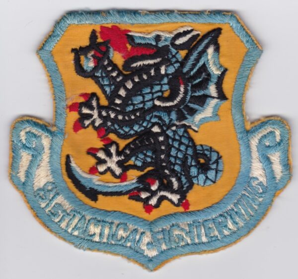 A USAF patch with a dragon on it.