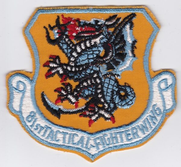 A USAF patch with a dragon on it.