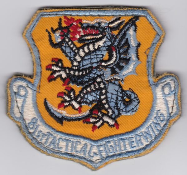 A USAF patch with a dragon on it.