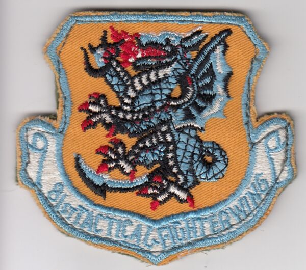 A USAF patch with a dragon on it.