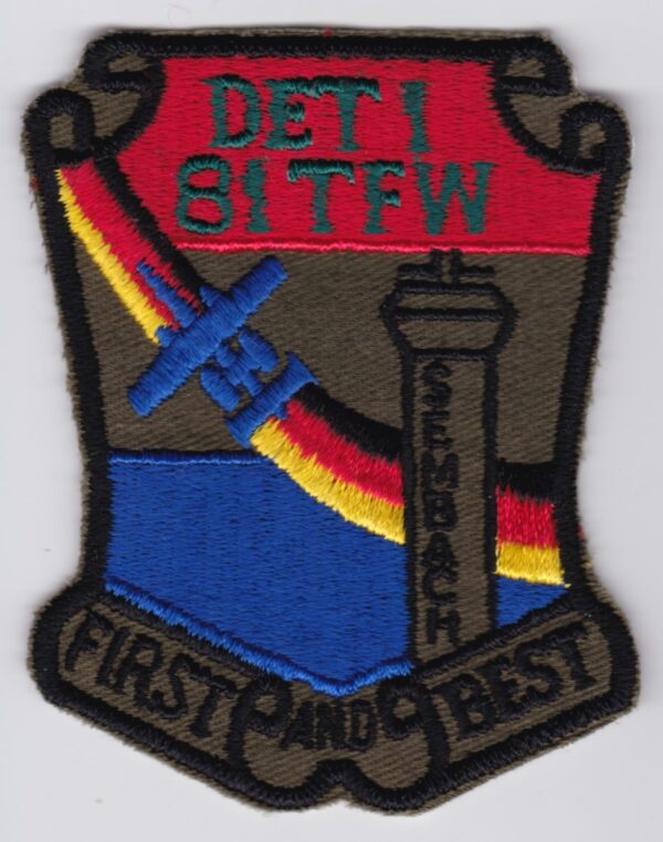 A patch with the words det 1st fw first and best.