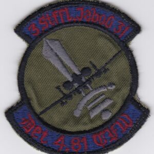 A patch with an image of a military plane.