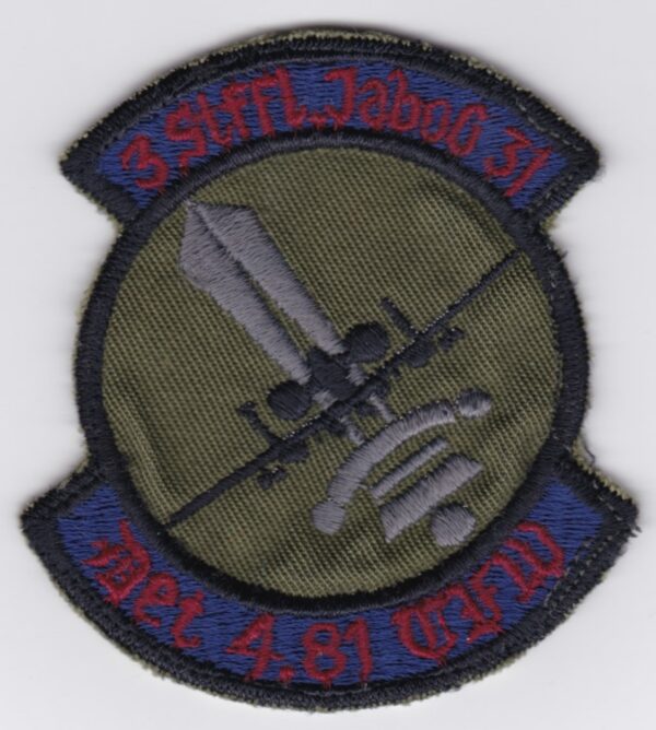 A patch with an image of a military plane.