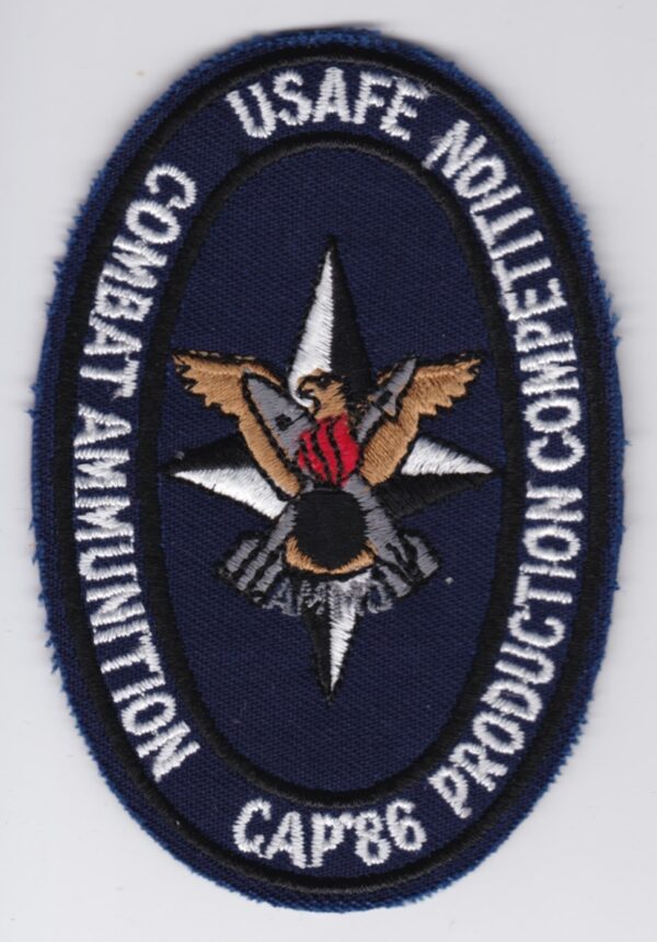 A patch with the words usa safe no compliant production.