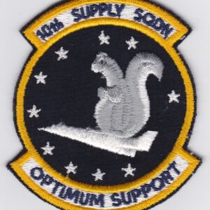 An embroidered patch with a squirrel on it.