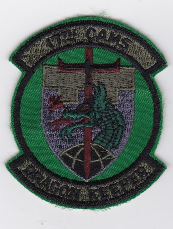 A green patch with the word cams on it.