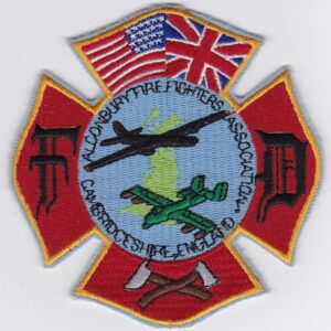 A firefighter's badge with the british flag on it.