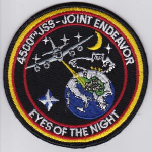 A patch with the words eyes of the night on it.