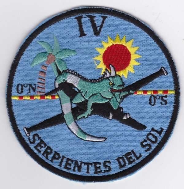 A patch with a lizard and a sun on it.