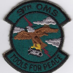 A patch with an eagle and the words oms tools for peace.