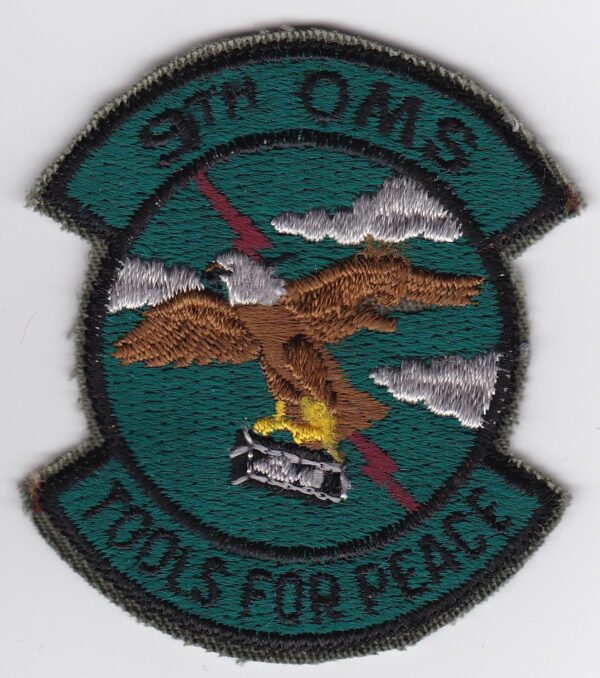 A patch with an eagle and the words oms tools for peace.