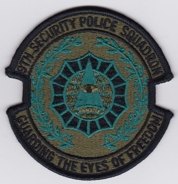 A patch with the words,'the eyes of terrorism'.