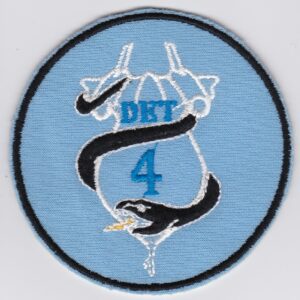 A blue patch with the letter dbt 4 on it.