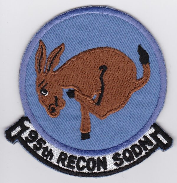 A badge with a donkey on it.