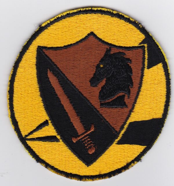 A black and yellow patch with a horse and sword on it.