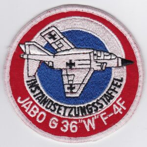 A patch with an image of a fighter jet.